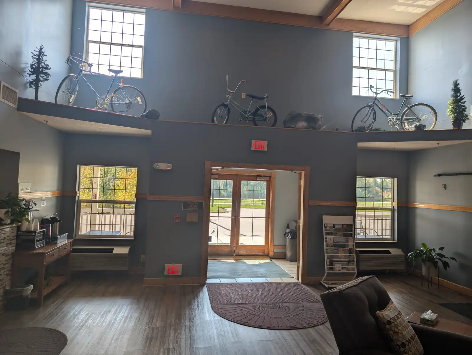 The lobby, with rental bikes mounted along the wall above the seating